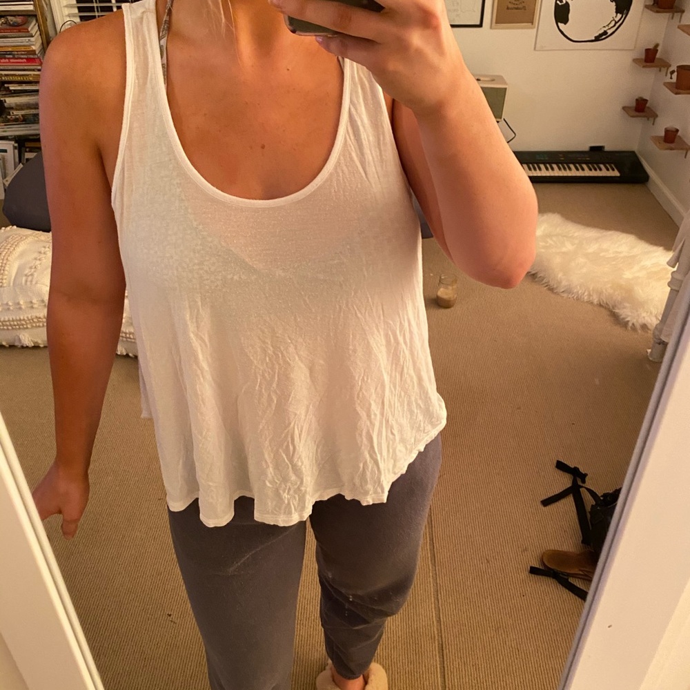 Perfect plain white tank with a high low cut!